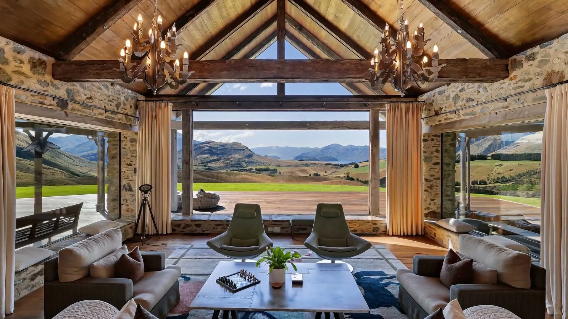Great room opening to the valley — frame from the Verdan property film